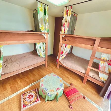Guest House Waraemon Nago Esterno foto