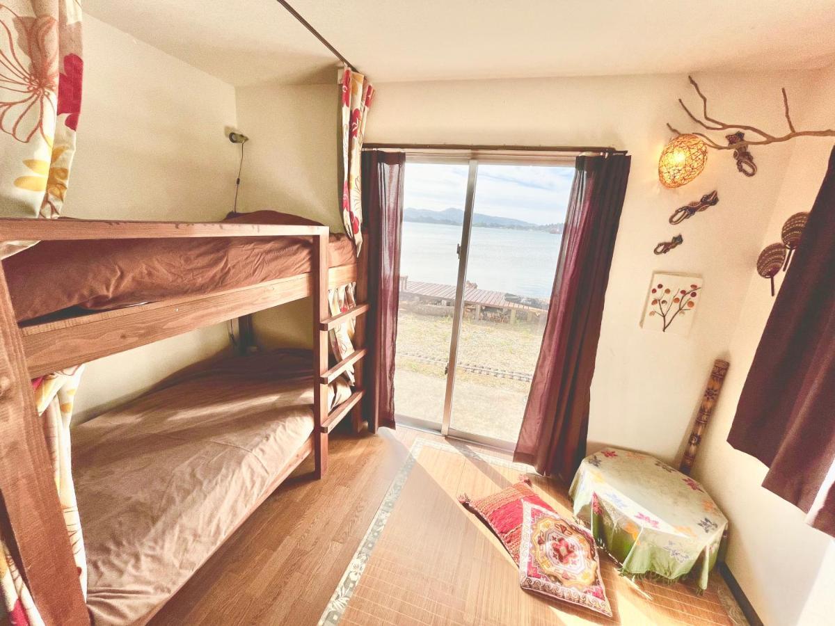 Guest House Waraemon Nago Esterno foto